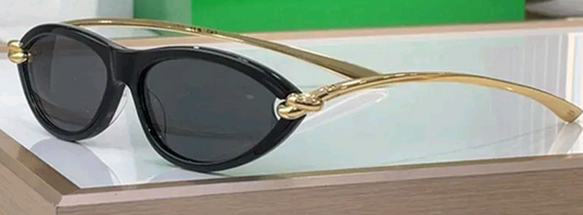 Furnizor Ochelari de Soare Cat-Eye cu Detaliu Nod Metalic | Damă & Bărbați + EBOOK GRATUIT